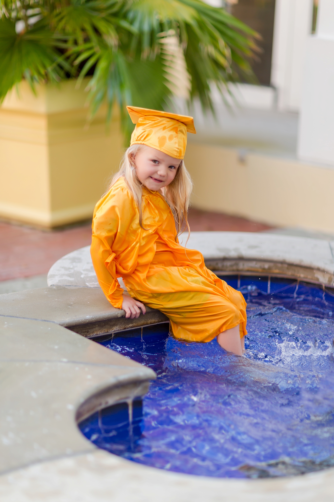 A splashing Preschool Graduation Lifestyle Photography by Brooke Tucker Photography