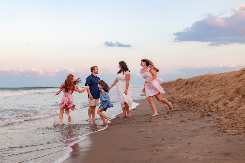 family on the beach at sunset brooke tucker photography