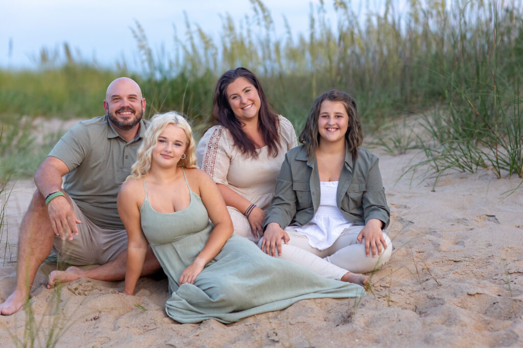 family on the beach at sunset brooke tucker photography